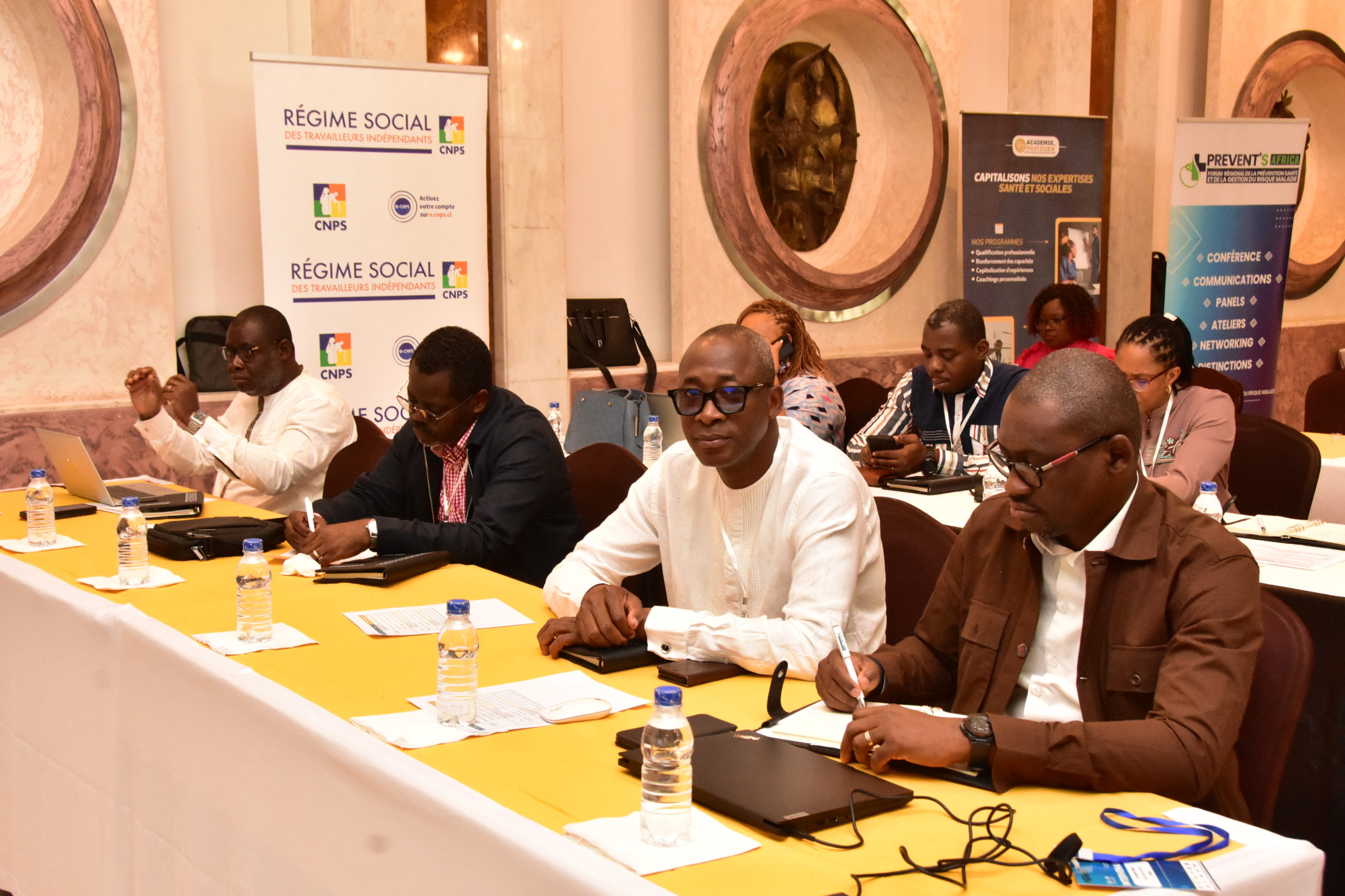 black flat screen tv turned on displaying man in black suit